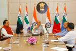 Raksha Mantri Shri Rajnath Singh reviewing the preparations of the forthcoming DefExpo 2022 at a meeting in New Delhi on September 27, 2022. Also seen are Raksha Rajya Mantri Shri Ajay Bhatt and Defence Secretary Dr Ajay Kumar.