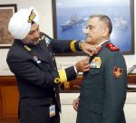 Secretary, Kendriya Sainik Board Commodore HP Singh pinning the Armed Forces Flag on Chief of Defence Staff General Anil Chauhan in New Delhi on December 06, 2022 ahead of Armed Forces Flag Day. 