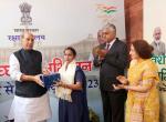 Raksha Mantri Shri Rajnath Singh felicitating Swachhata Veers, who ensure cleanliness in MoD Secretariat, in New Delhi on October 26, 2023. Also seen is Defence Secretary Shri Giridhar Aramane.