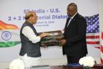 Raksha Mantri Shri Rajnath Singh handing over to US Secretary of Defence Mr Lloyd Austin, parts of parachute, uniform & airplane of US forces from World War II recovered in Assam, after their bilateral meeting in New Delhi on November 10, 2023.