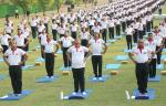 Raksha Mantri Shri Rajnath Singh performing Yoga with soldiers at 1 Corps in Mathura, Uttar Pradesh on the occasion of 10th International Day of Yoga on June 21, 2024. Also seen is Chief of the Army Staff General Manoj Pande.
